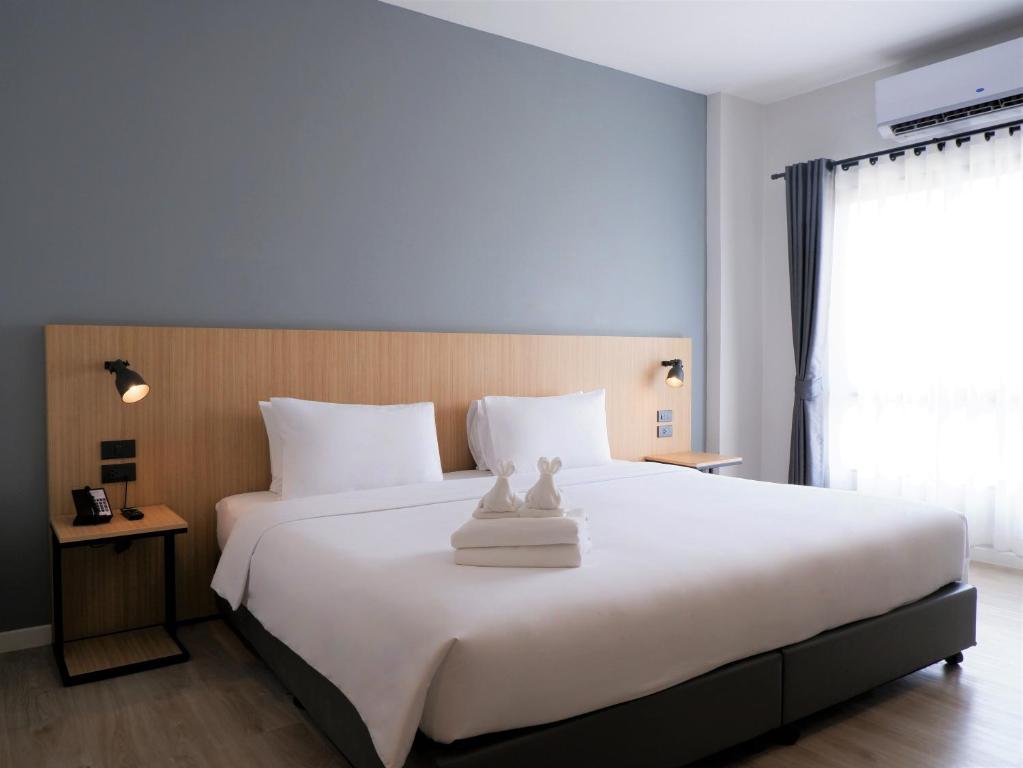 bliQ Hotel Chanthaburiにあるベッド