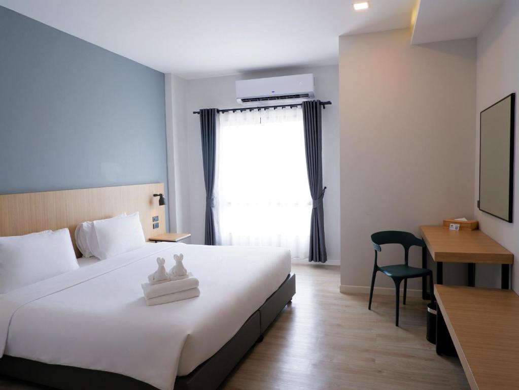 bliQ Hotel Chanthaburiにあるベッド