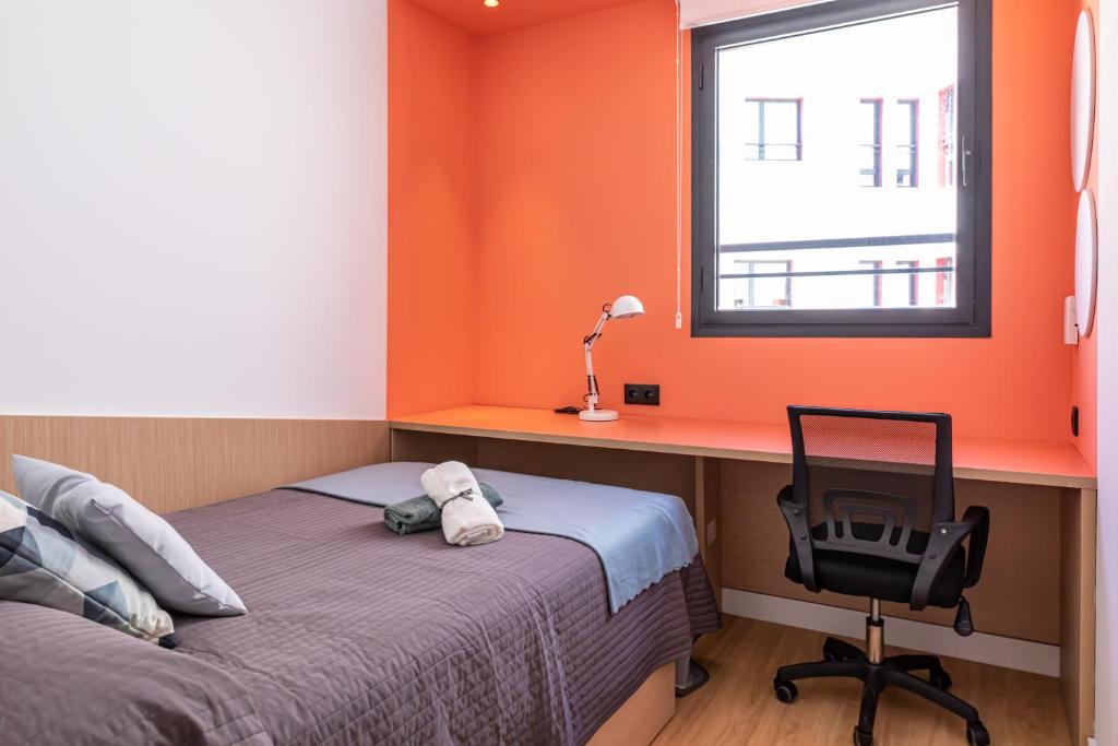 Posteľ alebo postele v izbe v ubytovaní Residencia Universitaria Resa Málaga Centro
