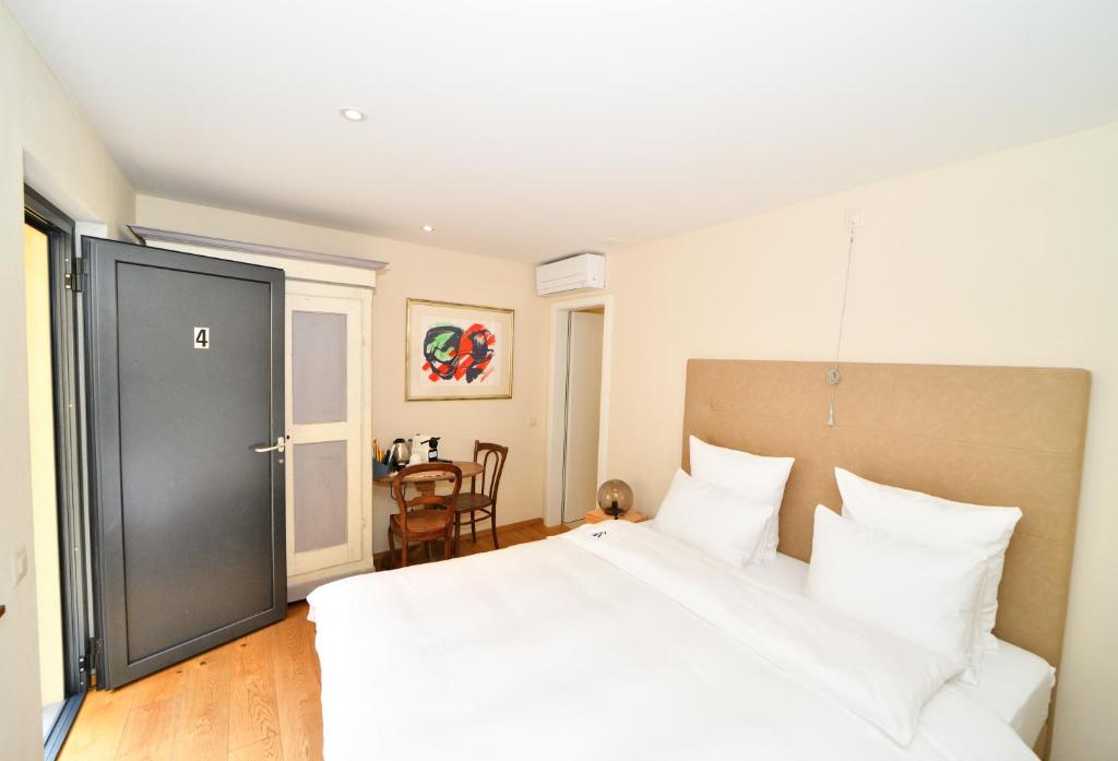 Postel nebo postele na pokoji v ubytování Boato Bistrot & Bed