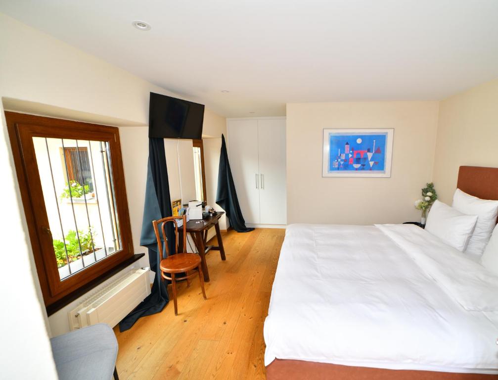 Postel nebo postele na pokoji v ubytování Boato Bistrot & Bed