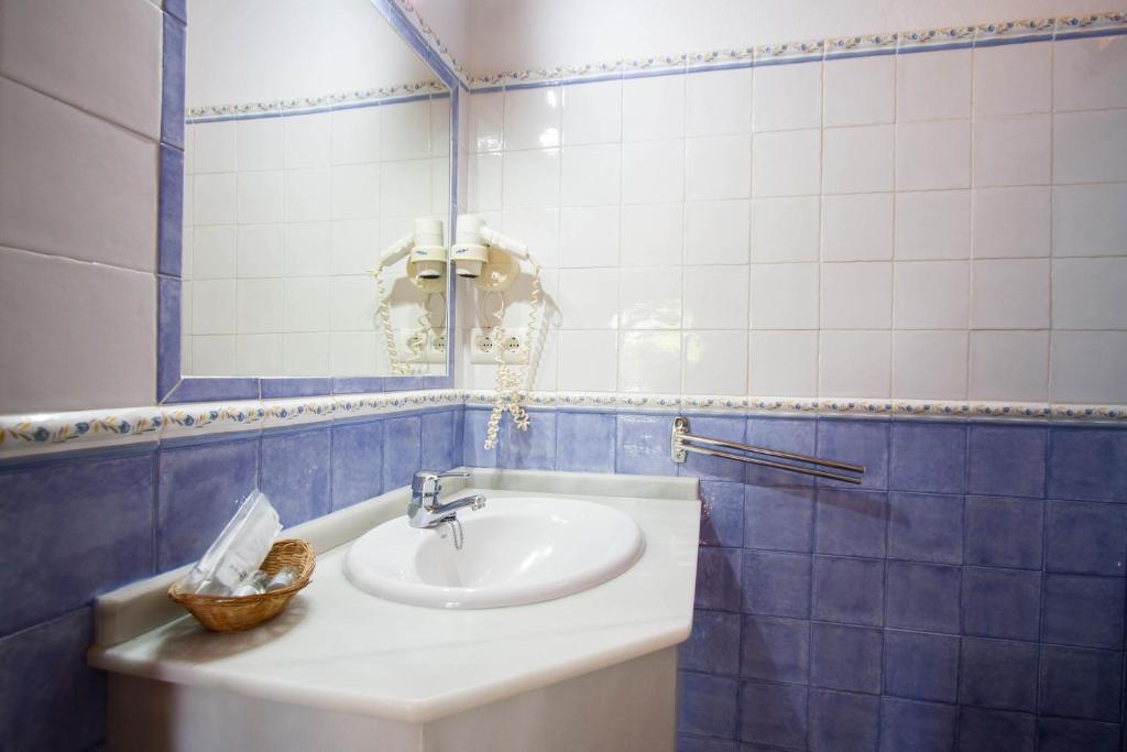 Kúpeľňa v ubytovaní Apartamentos Turisticos Trajano