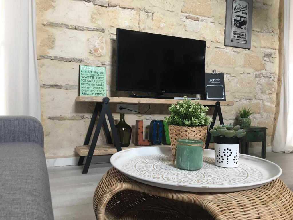 Telewizja i/lub zestaw kina domowego w obiekcie Loft Xerez Centro