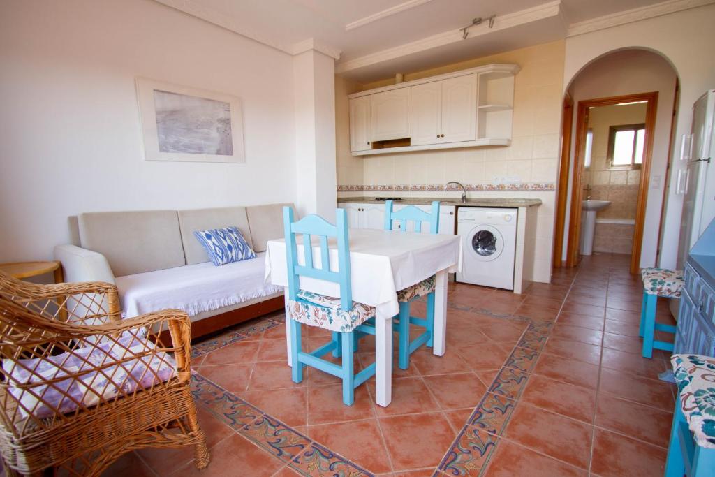 Kuchyňa alebo kuchynka v ubytovaní Apartamentos Turisticos Trajano