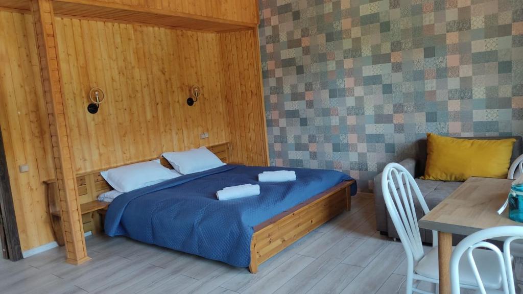 Llit o llits en una habitació de Borjomi Nest