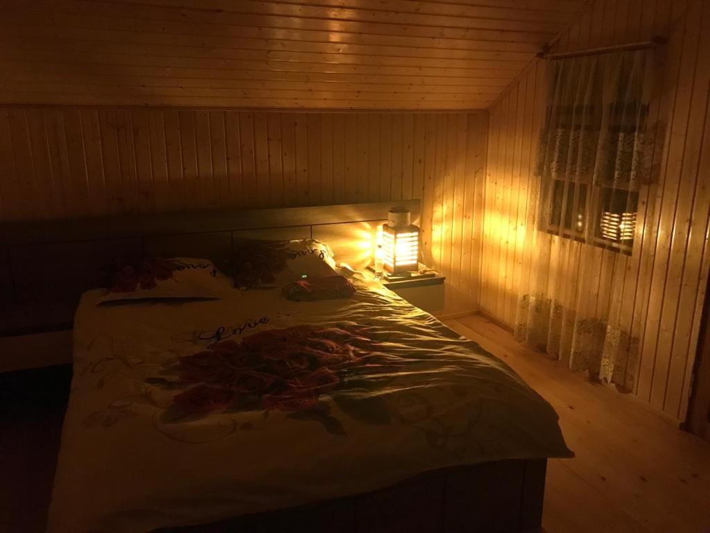 Postel nebo postele na pokoji v ubytování Guest house Lailashi