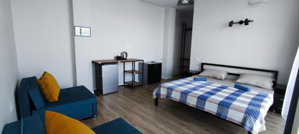 Postel nebo postele na pokoji v ubytování Guest house Garden Beach