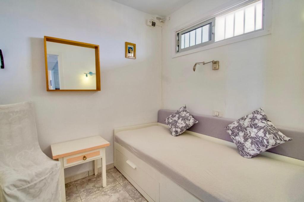 Posezení v ubytování 2 SCHLAFZIMMER FERIENWOHNUNG DiREKT AM STRAND