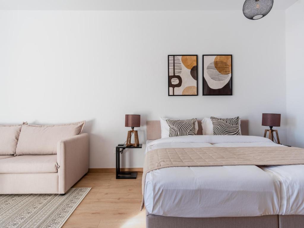 Postel nebo postele na pokoji v ubytování Armonta Residences by BeCyprus