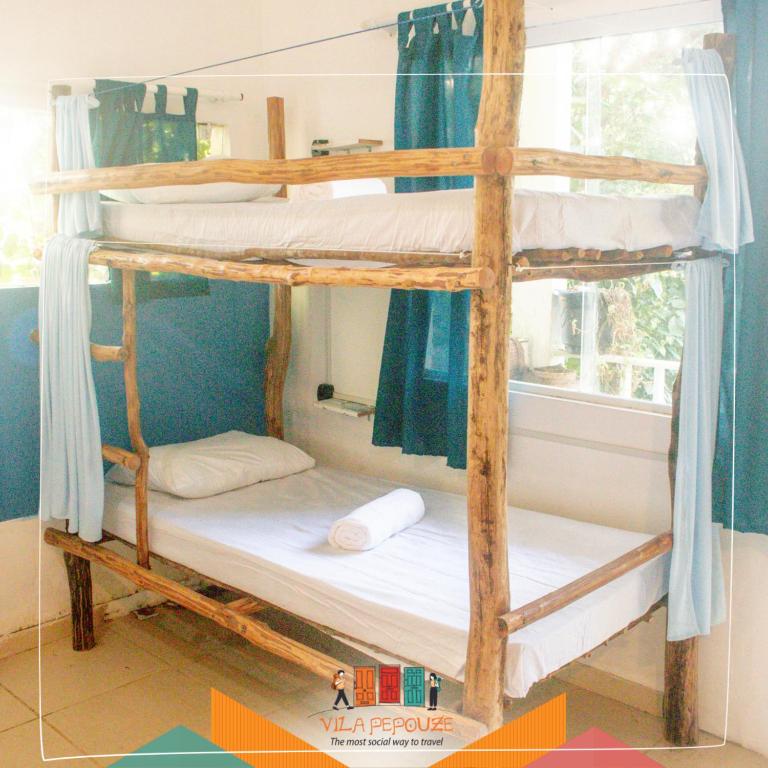 Voodi või voodid majutusasutuse Vila Pepouze Hostel toas