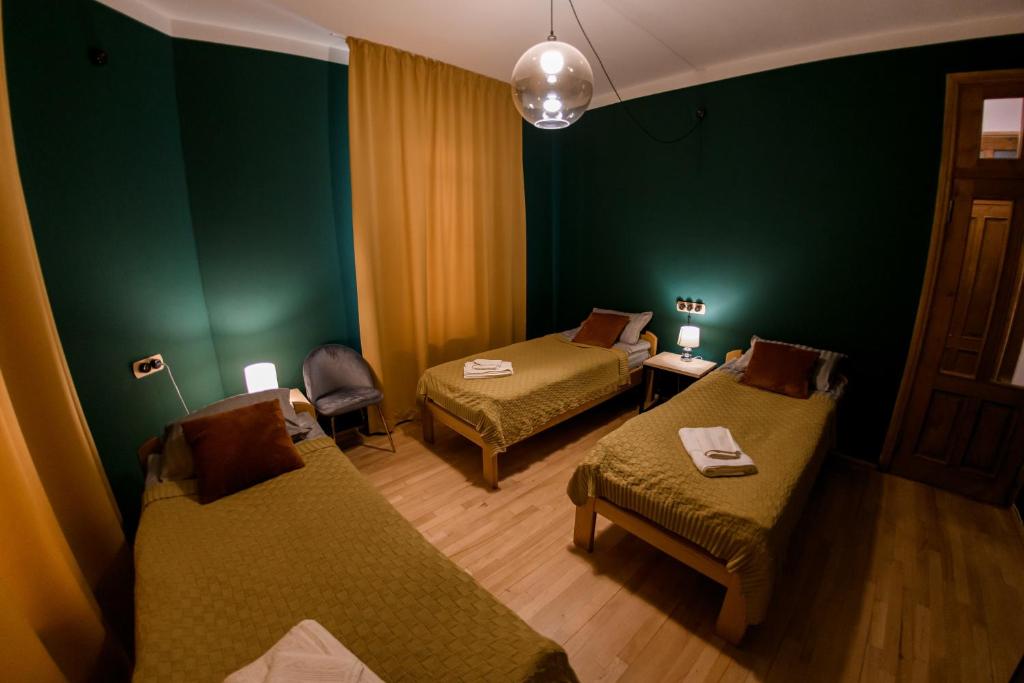 Postel nebo postele na pokoji v ubytování Ozon Gudauri