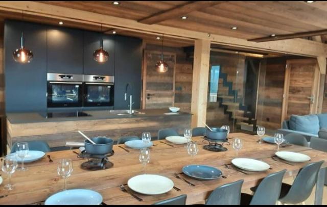 Köök või kööginurk majutusasutuses Chalet avec jacuzzi - 150 m des remontées