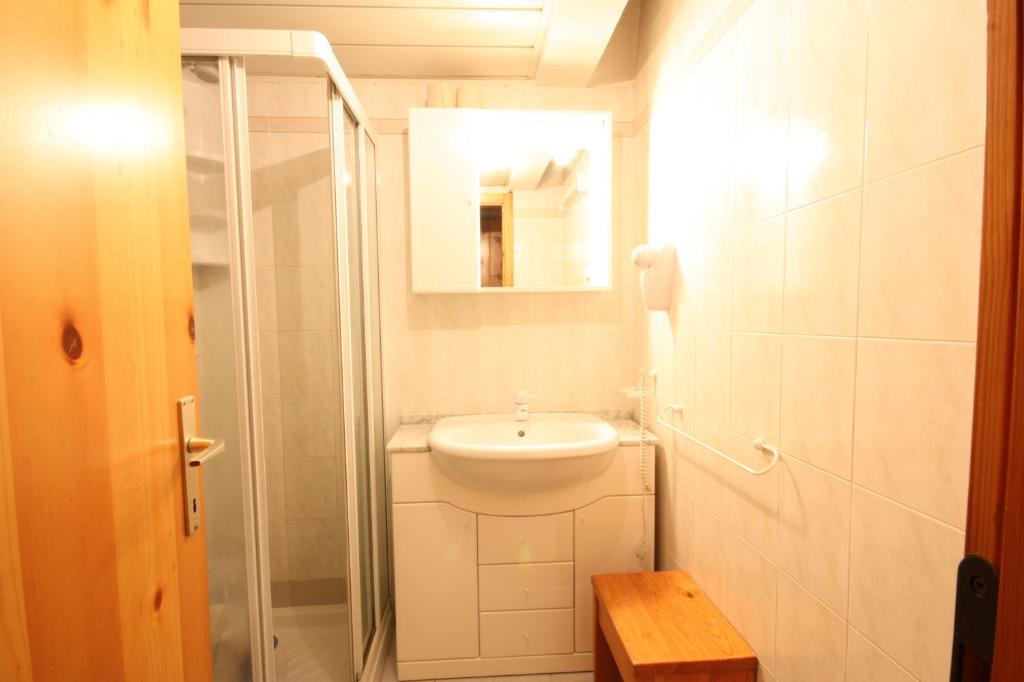 a small bathroom with a sink and a toilet at Marilleva 1400 Appartamenti Montana in Marilleva