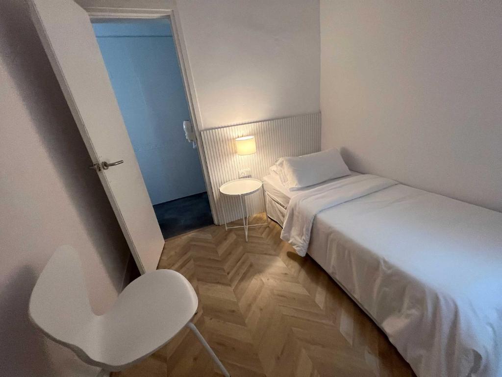 Postel nebo postele na pokoji v ubytování The MO GOTIC