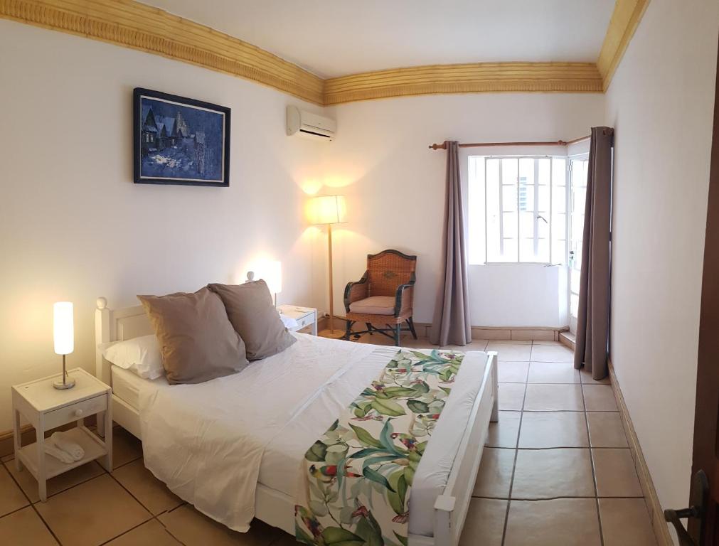 Postel nebo postele na pokoji v ubytování Villa Osiris