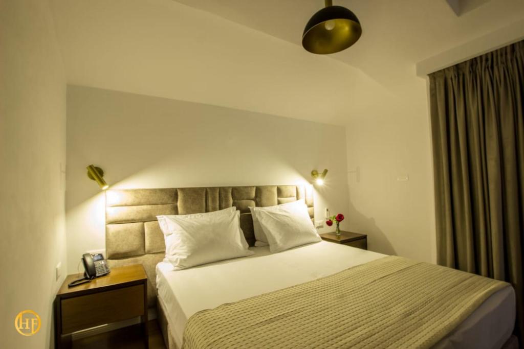 Postel nebo postele na pokoji v ubytování Hotel Fantasy
