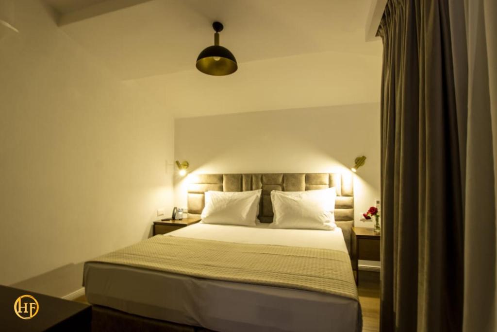 Postel nebo postele na pokoji v ubytování Hotel Fantasy
