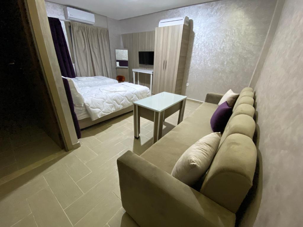 Postel nebo postele na pokoji v ubytování Hôtel Chark