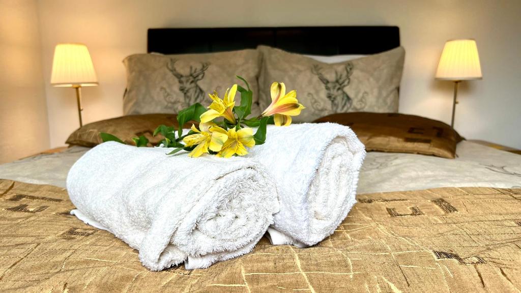 Una cama o camas en una habitación de Old Captain Guest House