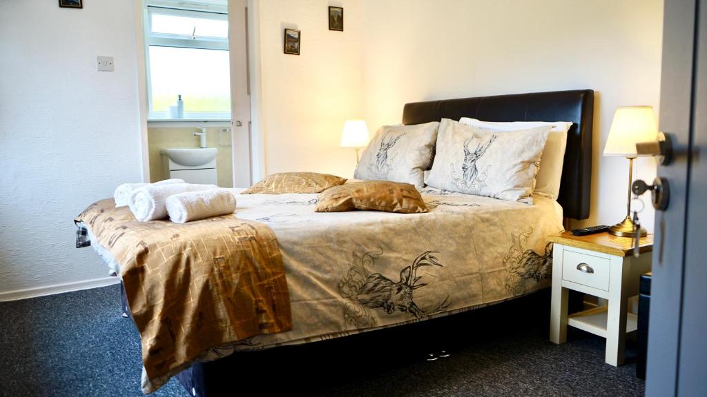 Una cama o camas en una habitación de Old Captain Guest House