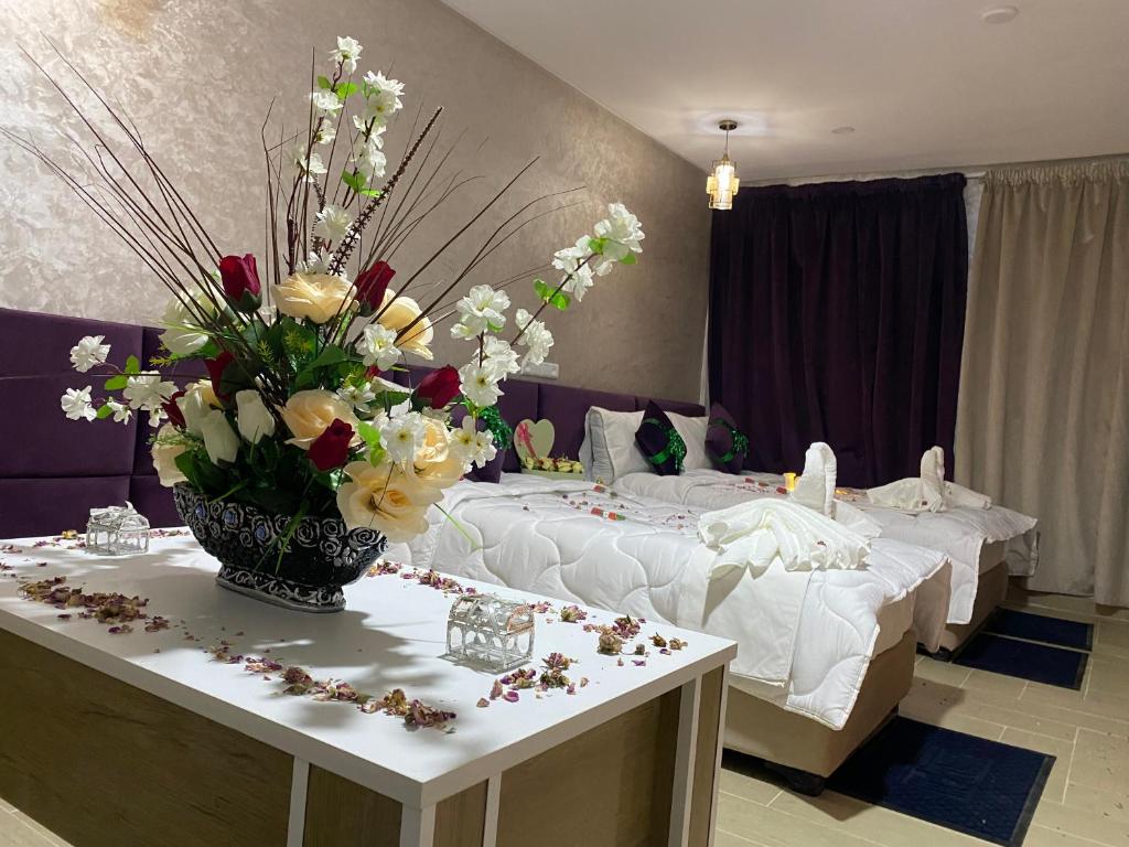 Postel nebo postele na pokoji v ubytování Hôtel Chark