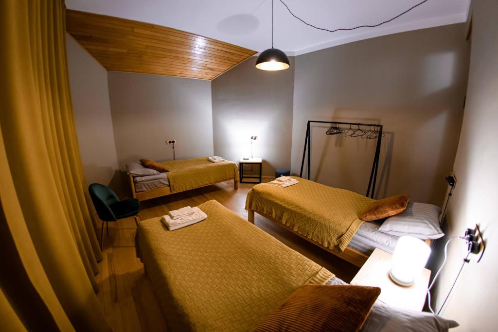 Postel nebo postele na pokoji v ubytování Ozon Gudauri