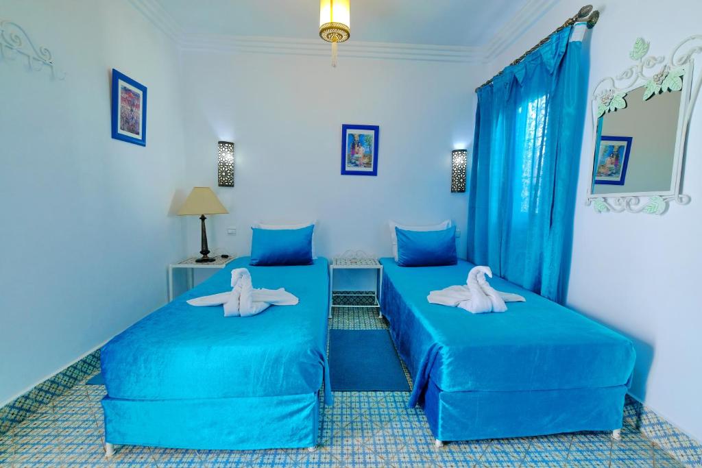Cama o camas de una habitación en Riad Hôtel Essaouira