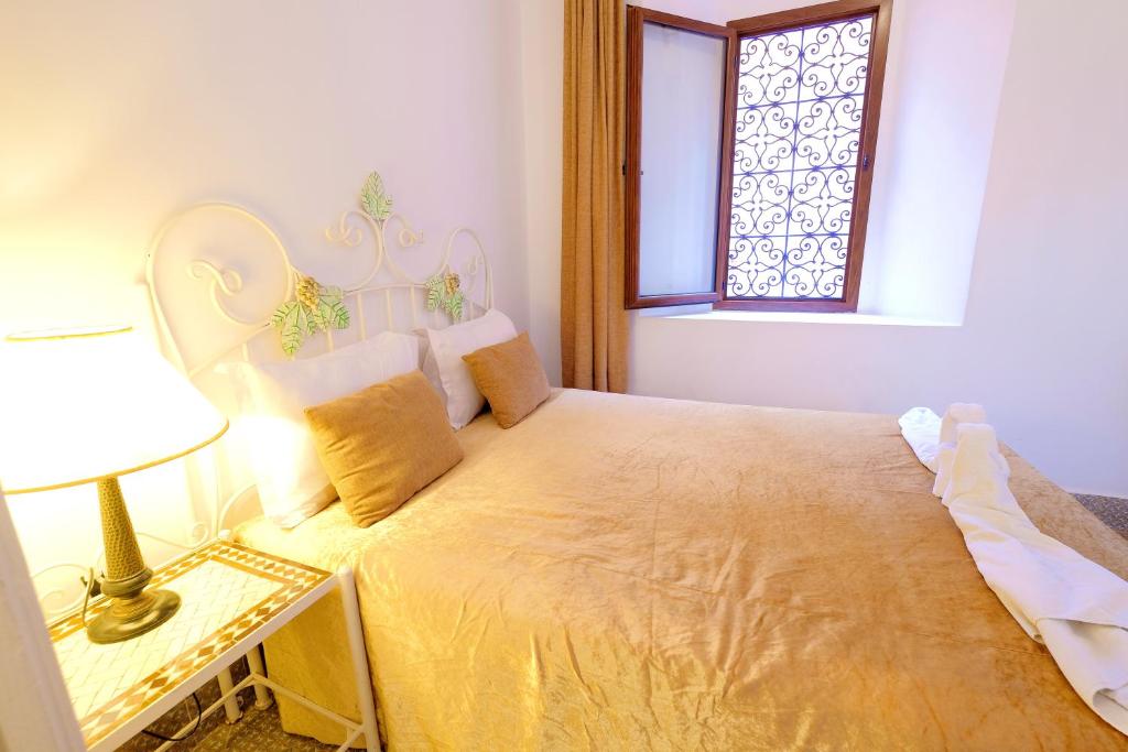 Cama o camas de una habitación en Riad Hôtel Essaouira