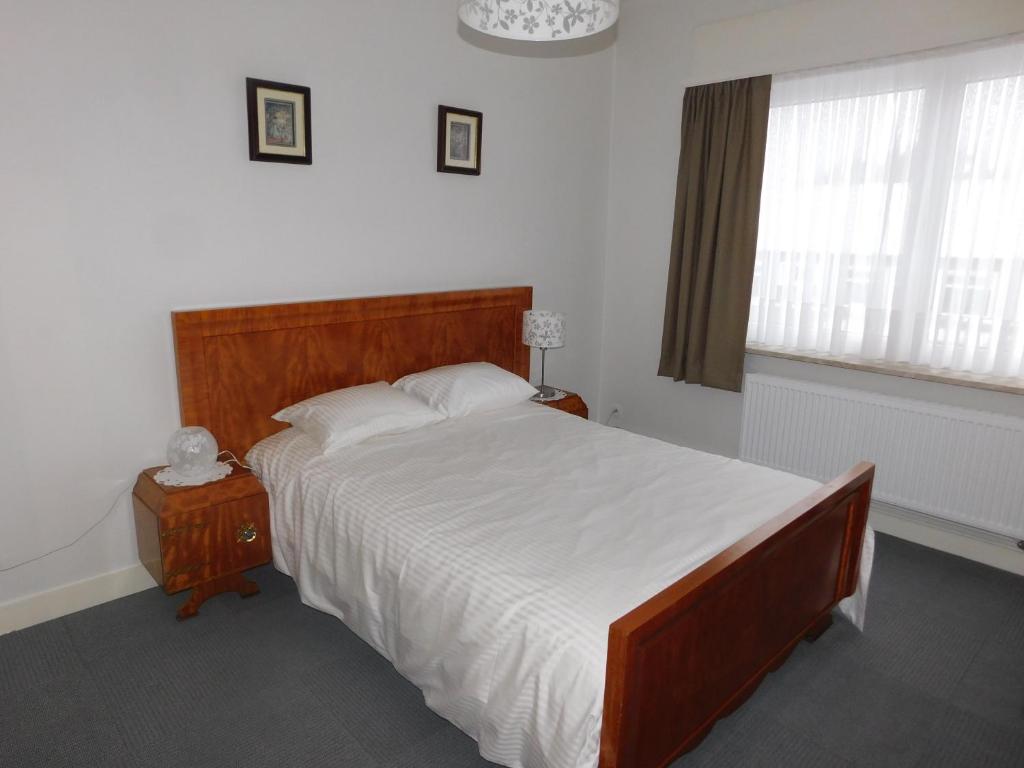 Postel nebo postele na pokoji v ubytování Vakantiewoning Louis