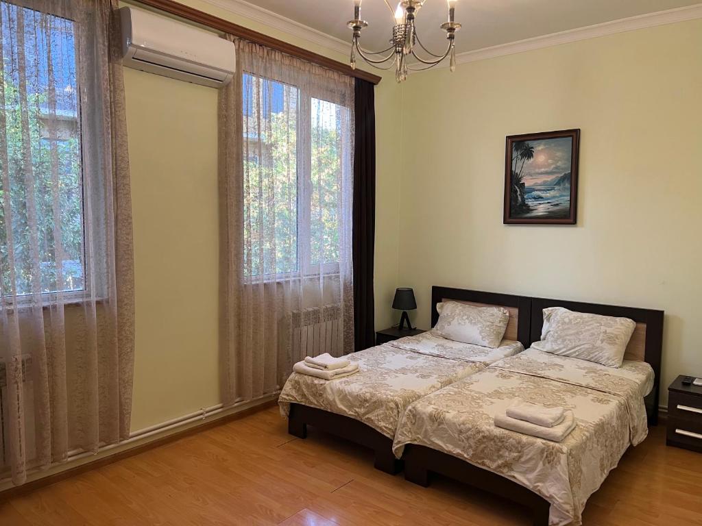 Postel nebo postele na pokoji v ubytování Arm Hotel