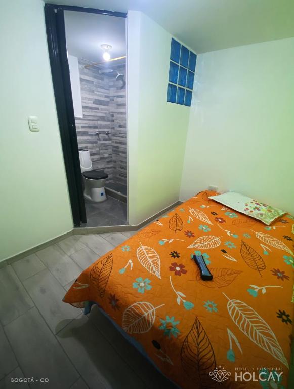 Postel nebo postele na pokoji v ubytování Hospedaje Holcay