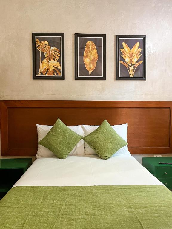 Postel nebo postele na pokoji v ubytování HOTEL KOOKAY VALLADOLID