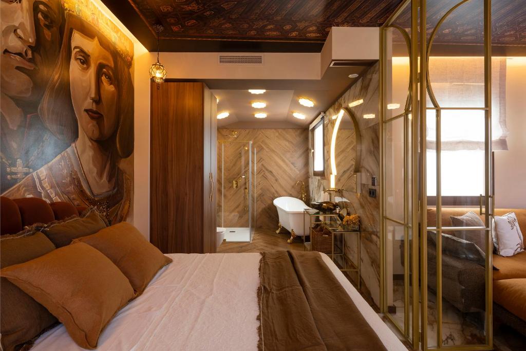 Postel nebo postele na pokoji v ubytování Palatina Concept Suites