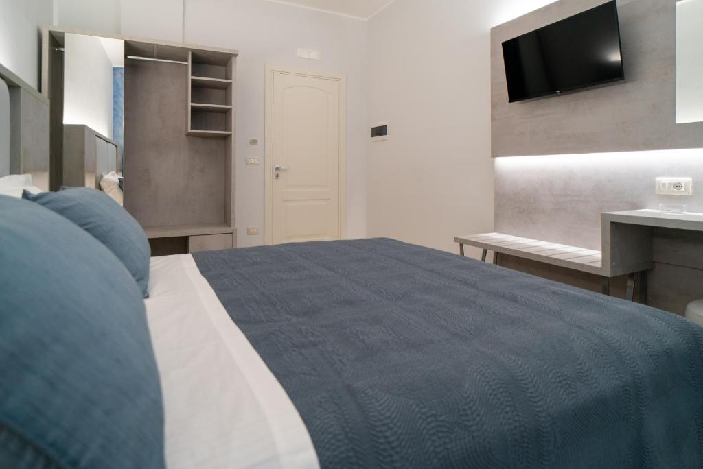 Postel nebo postele na pokoji v ubytování Le margherite B&B