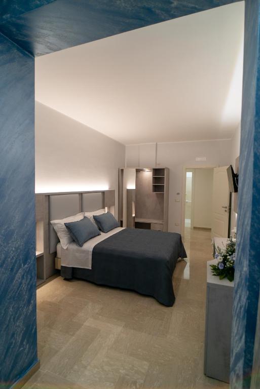 Postel nebo postele na pokoji v ubytování Le margherite B&B