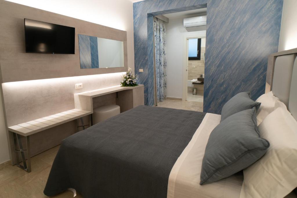 Postel nebo postele na pokoji v ubytování Le margherite B&B