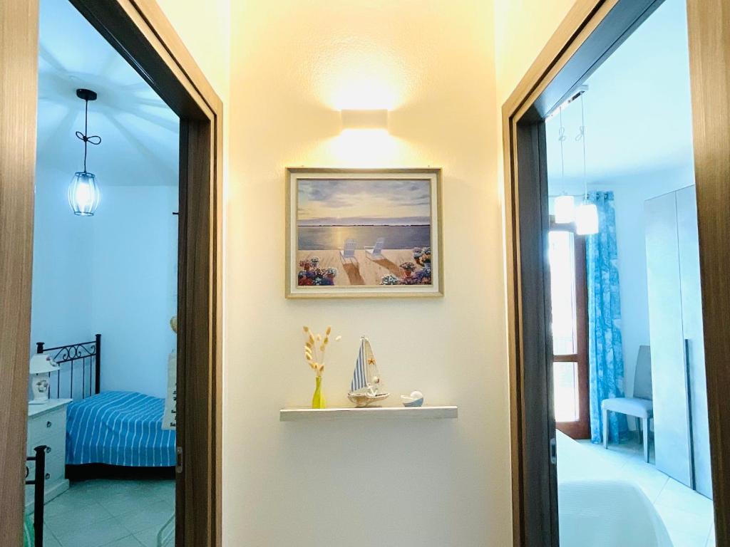 Posteľ alebo postele v izbe v ubytovaní Villa Kate Pula Sardegna