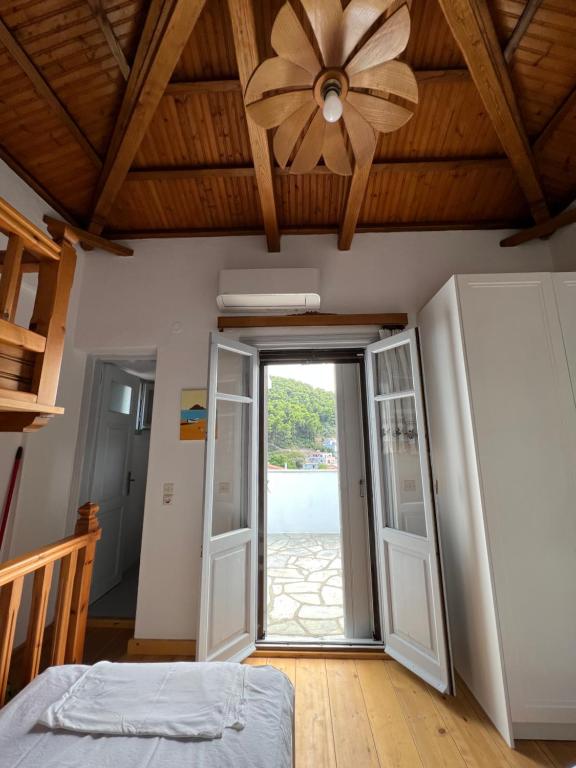 Postel nebo postele na pokoji v ubytování Elios Summer House