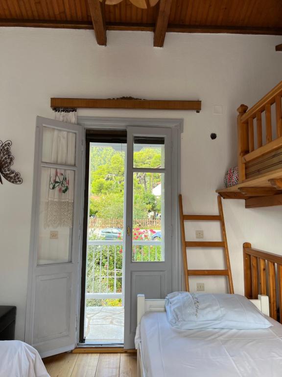 Postel nebo postele na pokoji v ubytování Elios Summer House