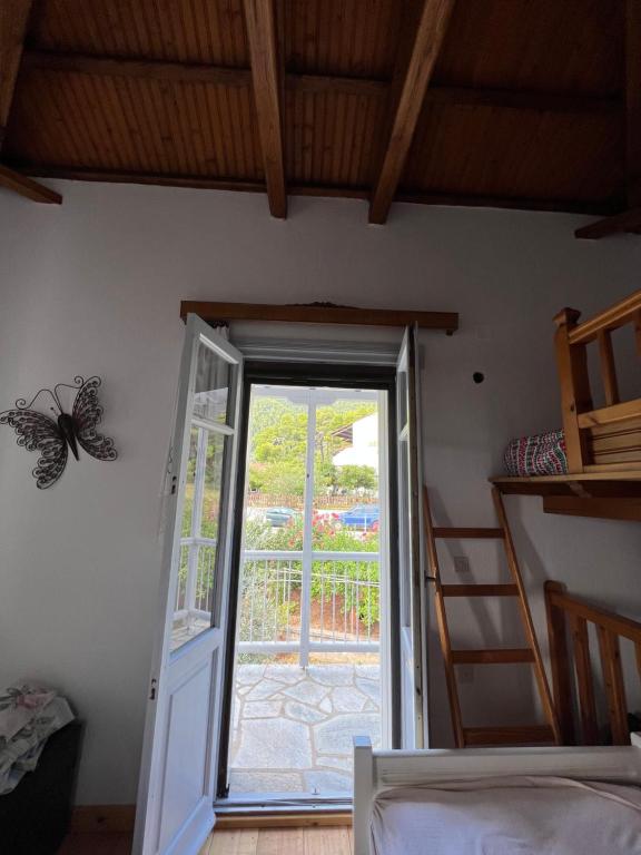 Postel nebo postele na pokoji v ubytování Elios Summer House