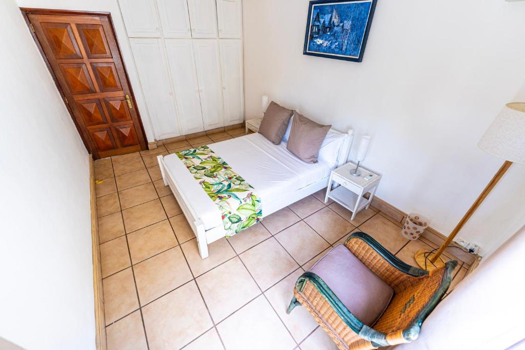 Postel nebo postele na pokoji v ubytování Villa Osiris