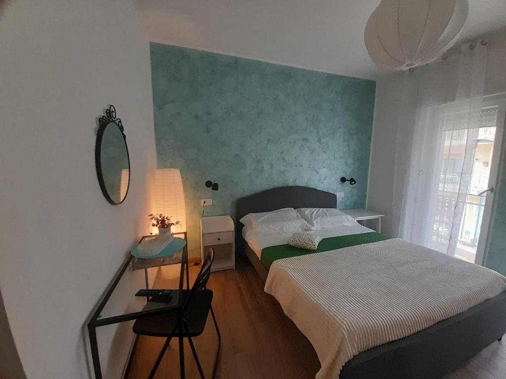 Postel nebo postele na pokoji v ubytování ARIEL ROOMS