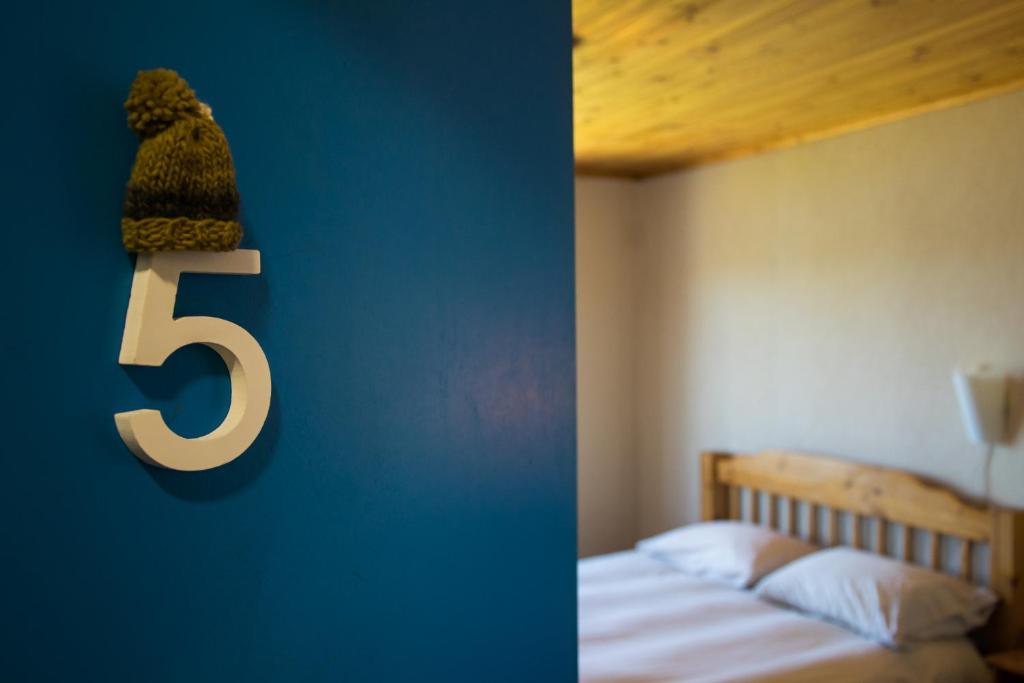 Postel nebo postele na pokoji v ubytování Hostal Mundo Nuevo