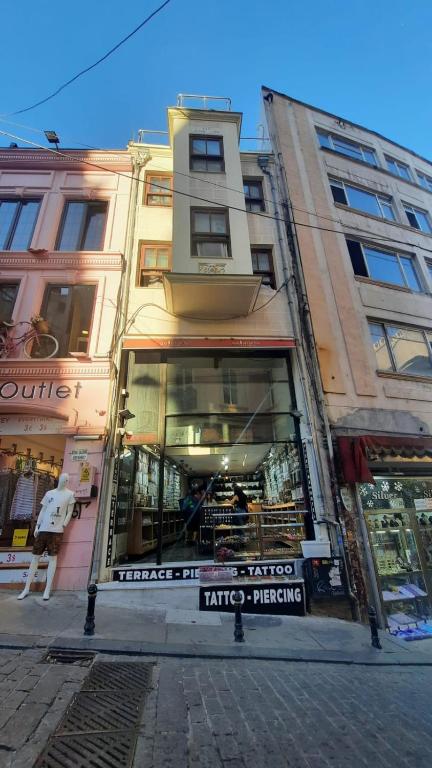 a store on a street in front of a building at Galata Life Istanbul in Istanbul