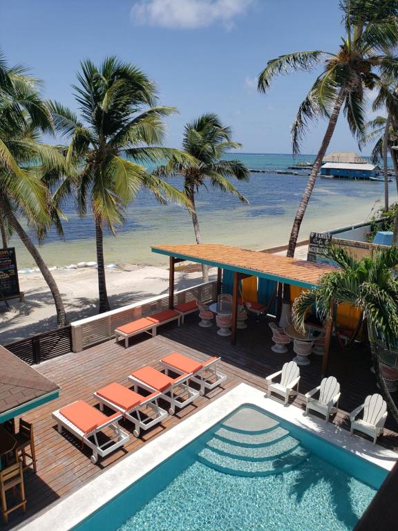 a view of the beach from a resort with a swimming pool at Ocean Tide Beach Resort in San Pedro