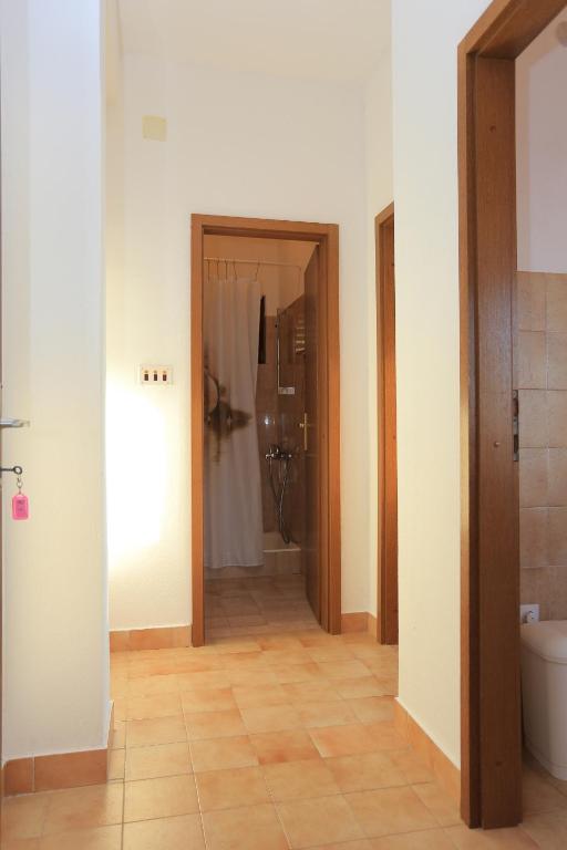 Kúpeľňa v ubytovaní Apartments by the sea Podgora, Makarska - 2614