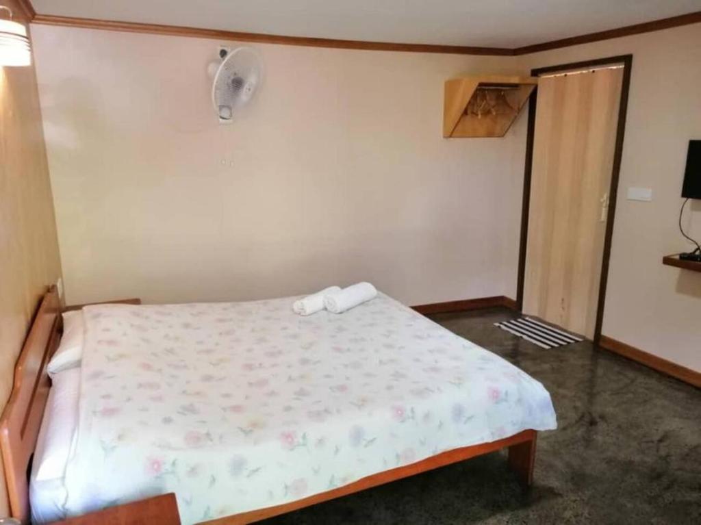 Postel nebo postele na pokoji v ubytování Seaside Travellers Inn