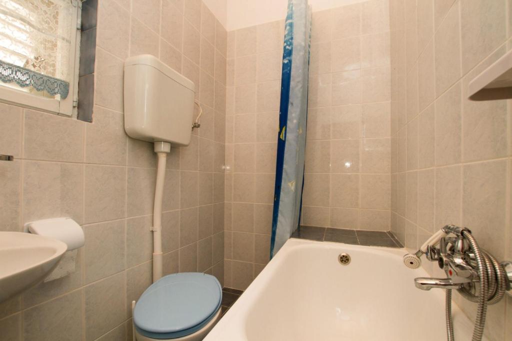 Kúpeľňa v ubytovaní Apartment Milna 2461c