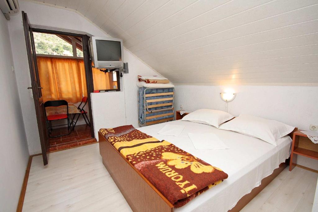 Postel nebo postele na pokoji v ubytování Apartments and rooms with WiFi Podaca, Makarska - 2613