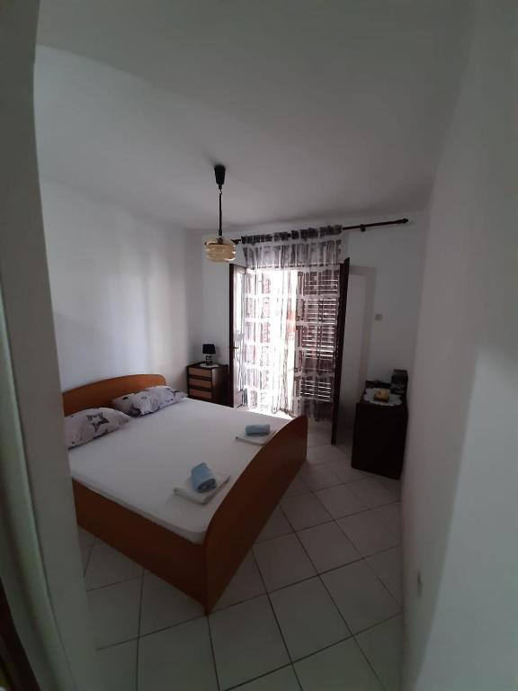Posteľ alebo postele v izbe v ubytovaní Apartments by the sea Podaca, Makarska - 2612